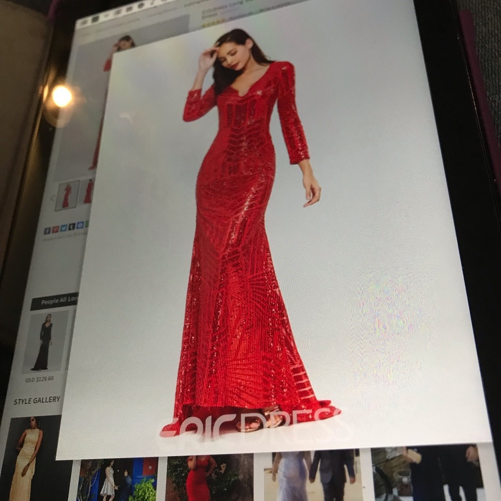 Red sequined long sleeve evening gown